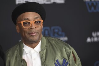 FILE - In this Dec. 16, 2019 file photo, Spike Lee arrives at the world premiere of "Star Wars: The Rise of Skywalker" in Los Angeles. Spike Lee will lead the jury of this year's Cannes Film Festival, and festival organizers hope the provocative American director will "shake things up" at the gathering of the world's cinema elite.(Jordan Strauss/Invision/AP, File )