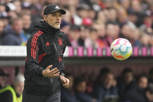 FILE - Bayern's head coach Thomas Tuchel passes the ball during the German Bundesliga soccer match between Bayern Munich and 1899 Hoffenheim, at the Allianz Arena stadium in Munich, Germany, Saturday, April 15, 2023. Tuchel will leave the club at the end of the season after a run of three straight losses raised the prospect of the club鈥檚 first season without a trophy in 12 years. Tuchel joined Bayern in March as the replacement for Julian Nagelsmann. (APPhoto/Matthias Schrader, File)