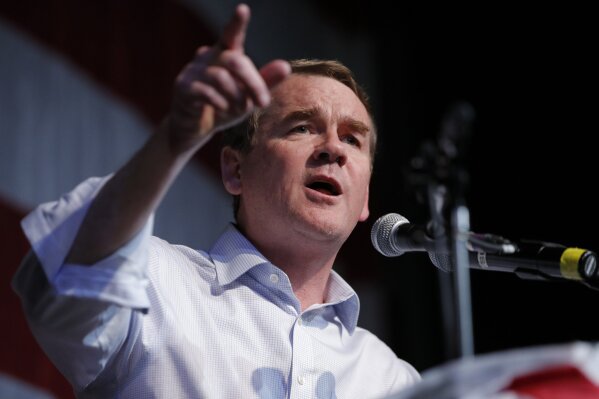 FILE - In this Aug. 9, 2019 file photo, Democratic presidential candidate Sen. Michael Bennet, D-Colo., speaks at the Iowa Democratic Wing Ding at the Surf Ballroom, in Clear Lake, Iowa. Bennet will be endorsed by former Colorado Sen. Gary Hart on Saturday at the New Hampshire Democratic party’s convention.  (AP Photo/John Locher)