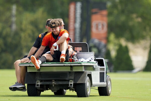 Joe Burrow injury news: Bengals QB carted off with calf injury during  training camp practice - Behind the Steel Curtain