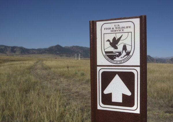 
              A sign marks a trail on the Rocky Flats National Wildlife Refuge outside Denver on Saturday, Sept. 15, 2018, the first day the refuge was open to the public. The refuge is on the outskirts of a former U.S. government factory that manufactured plutonium triggers for nuclear weapons.   (AP Photo/Dan Elliott)
            