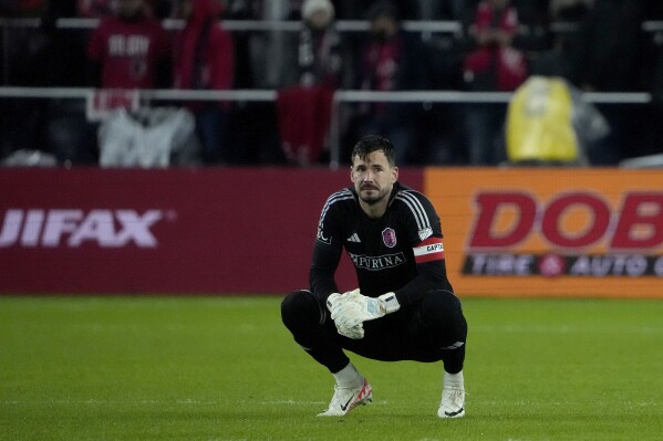 St. Louis City goalkeeper Roman Bürki watches in the final moments of an MLS playoff soccer match against Sporting Kansas City Sunday, Oct. 29, 2023, in St. Louis. Sporting Kansas City won 4-1. (AP Photo/Jeff Roberson)