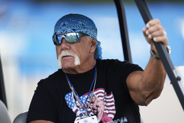 Former professional wrestler Hulk Hogan watches during a Detroit Lions NFL football practice in Allen Park, Mich., Thursday, July 25, 2024. (AP Photo/Paul Sancya)