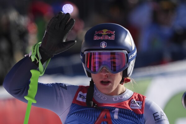 Italy's Sofia Goggia reacts after completing an alpine ski, women's World Cup downhill race, in Altenmarkt-Zauchensee, Austria, Saturday, Jan. 13, 2024. (AP Photo/Giovanni Auletta)