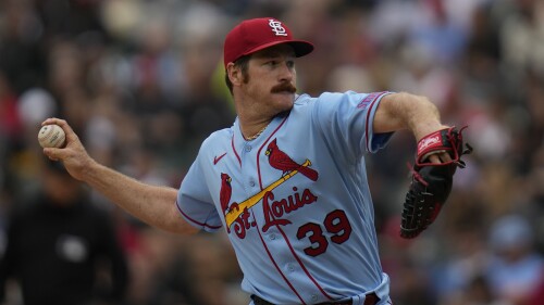 St. Louis Cardinals starting pitcher Miles Mikolas throws during the first inning of a baseball game against the Chicago White Sox, Saturday, July 8, 2023, in Chicago. (AP Photo/Erin Hooley)