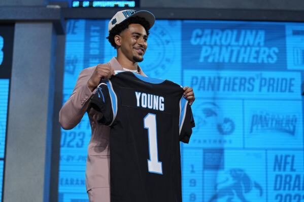 Alabama quarterback Bryce Young poses after being chosen by Carolina Panthers with the first overall pick during the first round of the NFL football draft, Thursday, April 27, 2023, in Kansas City, Mo. (AP Photo/Jeff Roberson)