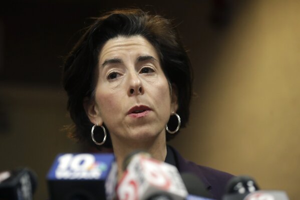 FILE - In this March 1, 2020 file photo, Rhode Island Gov. Gina Raimondo faces reporters during a news conference, in Providence, R.I. President-elect Joe Biden has picked Rhode Island Gov. Gina Raimondo to lead the Commerce Department.  (AP Photo/Steven Senne)
