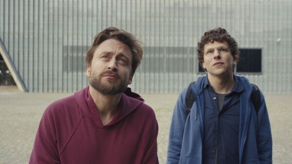 This image released by Sundance Institute shows Kieran Culkin, left, and Jesse Eisenberg in "A Real Pain" by Jesse Eisenberg, an official selection of the U.S. Dramatic Competition at the 2024 Sundance Film Festival. (Sundance Institute via AP)