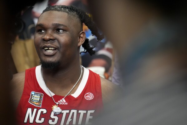 NC State forward DJ Burns Jr. speaks with reporters ahead of a Final Four college basketball game in the NCAA Tournament, Thursday, April 4, 2024, in Glendale, Ariz. NC State plays Purdue on Saturday. (AP Photo/Brynn Anderson )