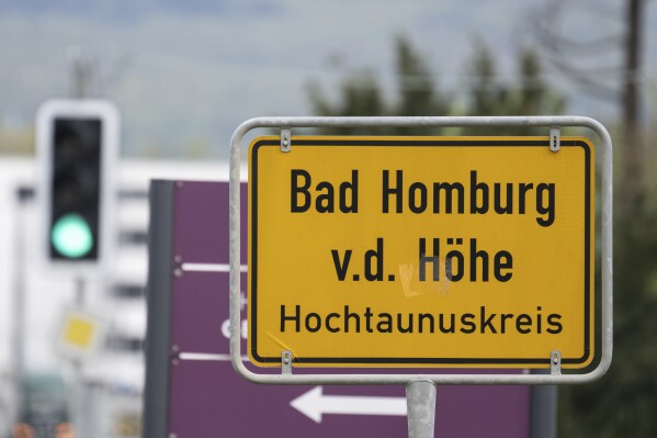 The town sign of Bad Homburg in the Taunus, Germany, Monday April 22, 2024. Three people suspected of spying for China and facilitating the transfer of information on technology with potential military uses were arrested in Germany on Monday. The homes and offices of the suspects, who were arrested in Duesseldorf and in Bad Homburg, near Frankfurt, were searched. (Boris Roessler/dpa via AP)