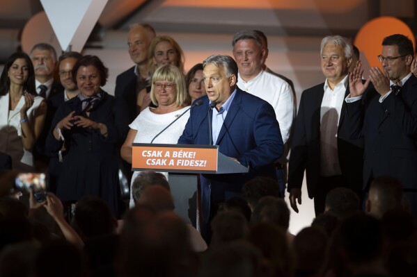 Hungarian Prime Minister Viktor Orban addresses the media after receiving the results of the European Parliamentary elections in Budapest, Hungary, early Monday, June 10, 2024. (AP Photo/Denes Erdos)