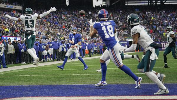 New York Giants wide receiver Isaiah Hodgins (18) runs with the