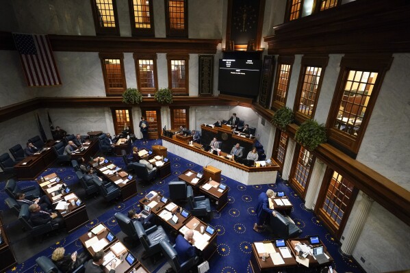 FILE - Indiana senators meet in the Senate chamber at the Statehouse, Feb. 1, 2024, in Indianapolis. Indiana lawmakers voted to lift a nearly 40-year ban on happy hours Tuesday, Feb. 20. (AP Photo/Darron Cummings, File)