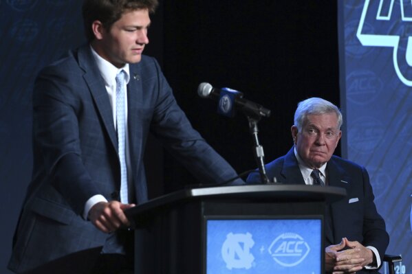 UNC Tar Heels quarterback Drake Maye responds to a question during the Atlantic Coast Conference NCAA college football media days in Charlotte, N.C. on Thursday, July 27, 2023. (Jeff Siner/The Charlotte Observer via AP)