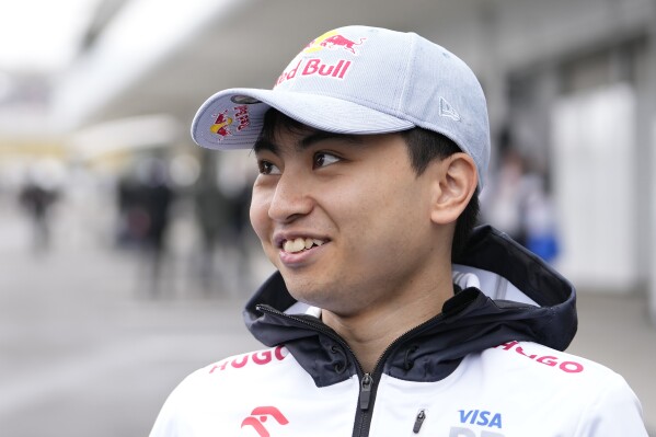 Ayumu Iwasa of Japan, reserve driver of RB, the team previously known as AlphaTauri before the second free practice session at the Suzuka Circuit in Suzuka, central Japan, Friday, April 5, 2024, ahead of Sunday's Japanese Formula One Grand Prix. (AP Photo/Hiro Komae)