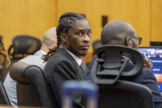 FILE - Atlanta rapper Young Thug, whose real name is Jeffery Williams, makes his first appearance at the Fulton County courthouse in Atlanta on Dec. 15, 2022. Opening statements began Monday, Nov. 27, 2023, and continued Tuesday in the racketeering conspiracy and gang trial for the rapper and five other people. (Arvin Temkar/Atlanta Journal-Constitution via AP, File)