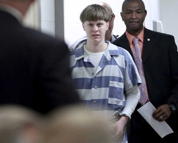 Dylann Roof enters the court room at the Charleston County Judicial Center on April 10, 2017, in Charleston, S.C. (Grace Beahm/The Post And Courier via AP, Pool, File)
