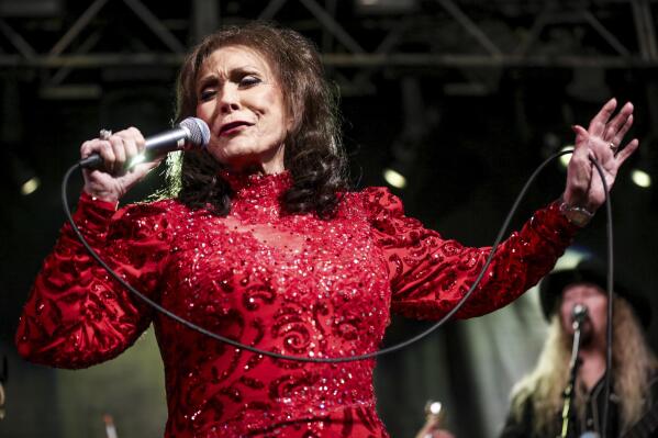 FILE - Loretta Lynn performs at the BBC Music Showcase during South By Southwest on March 17, 2016, in Austin, Texas. The Country Music Association Awards will open this year's show with a tribute to the late country queen Loretta Lynn. (Photo by Rich Fury/Invision/AP, File)