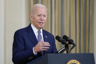 President Joe Biden speaks from the State Dining Room of the White House in Washington, Friday, Sept. 3, 2021, on the August jobs report. (AP Photo/Susan Walsh)