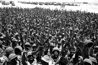 File - This June 10, 1967 file photo shows jubilant Israeli troops in Sinai, Egypt, during the Six-Day War. It may well be remembered as a pyrrhic victory for Israel: a six-day war in which it vanquished several Arab armies, only to be saddled with a 50-year fight with the Palestinians for the Holy Land. A half century after the watershed 1967 Mideast war, many in Israel think the lighting victory planted the seeds of doom. (AP Photo, File)