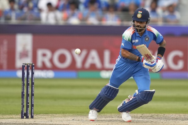 India's Virat Kohli plays a shot during the ICC Champions Trophy semifinal cricket match between India and Australia at Dubai International Cricket Stadium in Dubai, United Arab Emirates, Tuesday, March 4, 2025. (AP Photo/Altaf Qadri)