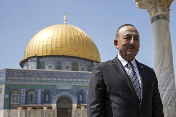 Turkish Foreign Minister Mevlut Cavusoglu visits the Al Aqsa Mosque compound in Jerusalem's Old City, Wednesday, May 25, 2022. (AP Photo/ Mahmoud Illean)