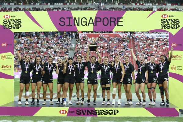 Team New Zealand wins the women's HSBC World Rugby Sevens Series 2024 cup final between Australia and New Zealand in Singapore, on Sunday, May 5, 2024. (AP Photo/Suhaimi Abdullah)