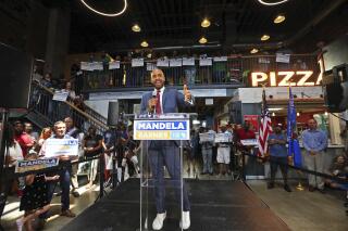 FILE - Wisconsin Lt. Governor, Mandela Barnes announces that he will be running for U.S. Senate at the Sherman Phoenix in this, July 20, 2021, file photo from Milwaukee. Barnes on Thursday, Dec. 9, 2021 proposed expanding voter rights, eliminating partisan gerrymandering, making Election Day a national holiday and ending the filibuster.(Angela Peterson/Milwaukee Journal-Sentinel via AP, File)