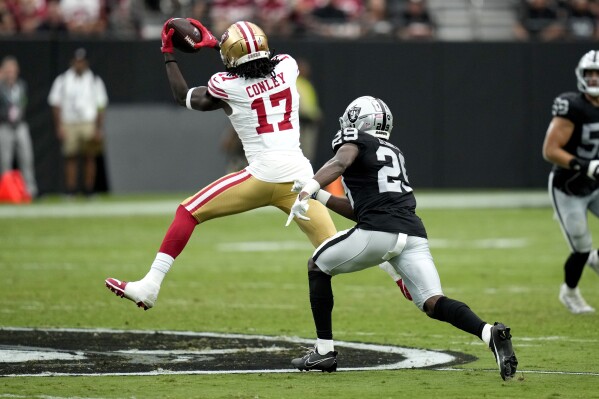 San Francisco 49ers wide receiver Chris Conley (17) makes a catch as Las Vegas Raiders cornerback Jakorian Bennett (29) defended during the first half of an NFL preseason football game, Sunday, Aug. 13, 2023, in Las Vegas. (AP Photo/John Locher)