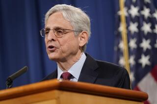 FILE - In this June 25, 2021 file photo, Attorney General Merrick Garland speaks during a news conference on voting rights at the Department of Justice in Washington. Garland has formally prohibited federal prosecutors from seizing the records of journalists in leak investigations. Garland's directive Monday reverses years of department policy.  (AP Photo/Patrick Semansky)