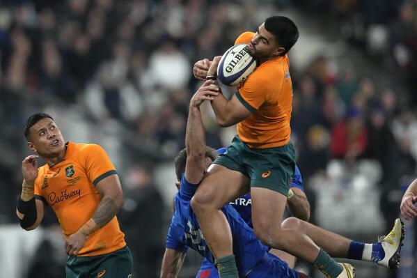 Australia's Tom Wright claims the ball during the Autumn Nations Cup rugby union international match between France and Australia at the Stade de France, in Saint-Denis, near Paris, Saturday, Nov. 5, 2022. (AP Photo/Thibault Camus)
