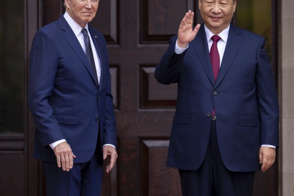 President Joe Biden greets China's President President Xi Jinping at the Filoli Estate in Woodside, Calif., Wednesday, Nov, 15, 2023, on the sidelines of the Asia-Pacific Economic Cooperative conference. (Doug Mills/The New York Times via AP, Pool)