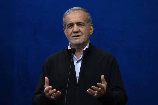 Iranian President Masoud Pezeshkian speaks during his press conference in Tehran, Iran, Monday, Sept. 16, 2024. (AP Photo/Vahid Salemi)