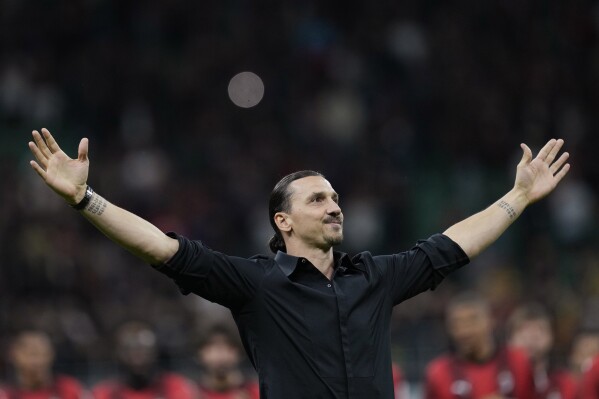 FILE - AC Milan's Zlatan Ibrahimovic reacts after his last game for the club at the end of a Serie A soccer match between AC Milan and Hellas Verona at the San Siro stadium, in Milan, Italy, Sunday, June 4, 2023. A beleaguered AC Milan could be set to call on its talismanic Swede yet again. Zlatan Ibrahimovic officially retired at the end of last season with an emotional speech at San Siro that left many in tears. But during a difficult October Milan has reportedly been in constant contact with the 42-year-old about a potential third spell at the club in an off-the-field capacity. (AP Photo/Antonio Calanni, File)