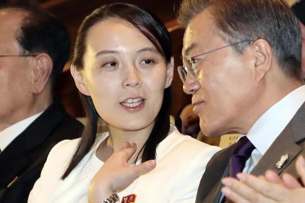 FILE - Kim Yo Jong, center, North Korean leader Kim Jong Un's sister, talks with South Koran President Moon Jae-in, right, as they watch a performance of North Korea's Samjiyon Orchestra at National Theater in Seoul, South Korea, on Feb. 11, 2018. For the second time in days, the powerful sister of North Korean leader Kim Jong Un berated South Korea for touting its supposed preemptive strike capabilities against the North, saying her country's nuclear forces would annihilate the South's conventional forces if provoked.(Bee Jae-man/Yonhap via AP, File)
