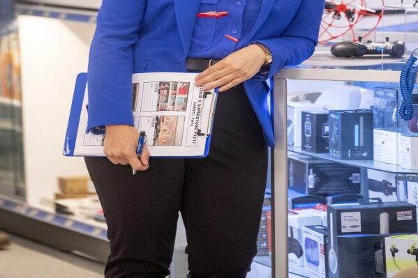 This image released by NBC shows America Ferrera as Amy in a scene from the comedy series "Superstore." Ferrera says she’s departing the NBC sitcom after its current season. The season five finale will air on April 18 at 8 p.m. EST. (Ron Batzdorff/NBC via AP)