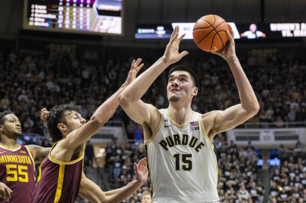 Purdue center Zach Edey (15) shoots during the second half of an NCAA college basketball game against Minnesota, Sunday, Dec. 4, 2022, in West Lafayette, Ind. (AP Photo/Doug McSchooler)