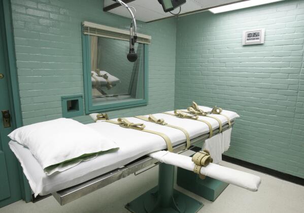 FILE - The gurney in Huntsville, Texas, where inmates are strapped down to receive a lethal dose of drugs, is shown May 27, 2008. Public support and use of the death penalty in 2022 continued its more than two-decade long decline in the U.S., and many of the executions that were carried out were “botched” or highly problematic, according to an annual report on capital punishment released Friday, Dec. 16. (AP Photo/Pat Sullivan, File)