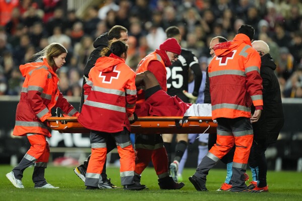 Valencia defender Diakhaby to undergo knee surgery after gruesome injury in  La Liga | AP News