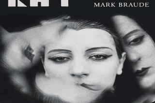 This cover image released by W.W. Norton shows Kiki Man Ray: Art, Love, and Rivalry in 1920s Paris" by Mark Braude. (W.W. Norton via AP)