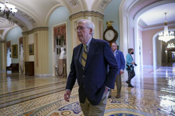 Senate Minority Leader Mitch McConnell, R-Ky., walks to the chamber for final votes before the Memorial Day recess, at the Capitol in Washington, Friday, May 28, 2021. Senate Republicans successfully blocked the creation of a commission to study the Jan. 6 insurrection by rioters loyal to former President Donald Trump. (AP Photo/J. Scott Applewhite)