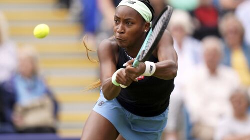 Coco Gauff from the US returns the ball to Jessica Pegula from the US during their women's singles quarterfinal match on day six of the Rothesay International Eastbourne tennis tournament at Devonshire Park, Eastbourne, Britain, Thursday, June 29, 2023. (Gareth Fuller/PA via AP)