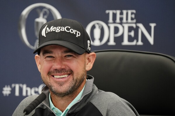 United States' Brian Harman speaks at a press conference following the completion of his second round during the second day of the British Open Golf Championships at the Royal Liverpool Golf Club in Hoylake, England, Friday, July 21, 2023. (AP Photo/Jon Super)