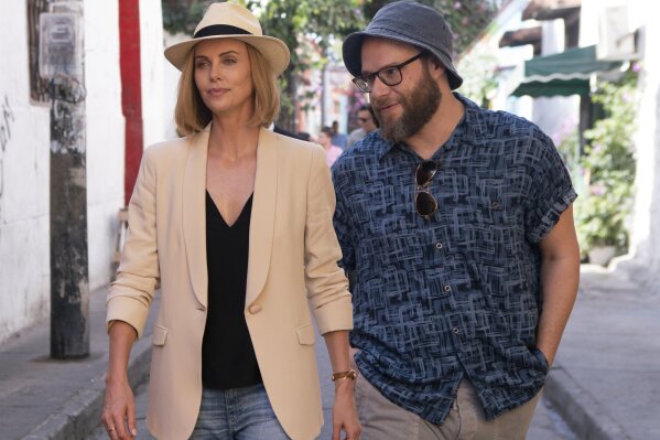 
              This image released by Lionsgate shows Charlize Theron, left, and Seth Rogen in a scene from "Long Shot." (Hector Alvarez/Lionsgate via AP)
            