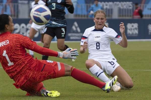 Charlotte Kohler of the United States scores her side's second goal against Argentina, during a women's soccer match at the Pan American Games in Valparaiso, Chile, Saturday, Oct. 28, 2023. (AP Photo/Matias Basualdo)