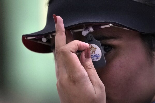 Palak of India prepares to shoot on her way to gold at the Shooting 10m Air Pistol Women Final of the 19th Asian Games in Hangzhou, China, Friday, Sept. 29, 2023. (AP Photo/Ng Han Guan)