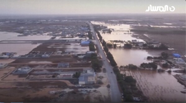 This image taken from video provided by Libya Almasar TV shows flooding in Marj, Libya, Monday, Sept. 11, 2023. Mediterranean storm Daniel has caused devastating floods in Libya, sweeping away entire neighbourhoods and leaving areas of farmland under water in multiple coastal towns in the east of the North African nation. (Libya Almasar TV via AP)