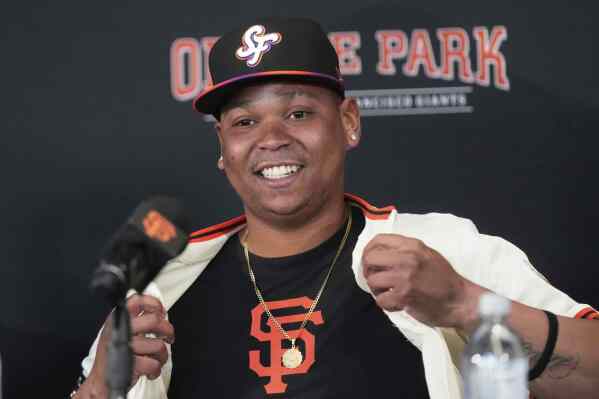 San Francisco Giants' Rafael Devers speaks at a news conference before a baseball game against the Cleveland Guardians in San Francisco, Tuesday, June 17, 2025. (AP Photo/Jeff Chiu)