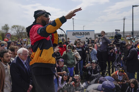 FILE - Chris Smalls, president of the Amazon Labor Union, speaks at a rally outside an Amazon warehouse on Staten Island in New York, April 24, 2022. The Amazon Labor Union, a grassroots labor group that won a major victory at an Amazon warehouse two years ago, has agreed to affiliate with the Teamsters union, announced Tuesday, June 4, 2024, a move that’s bound to inject new energy into the struggling organization. (AP Photo/Seth Wenig, File)