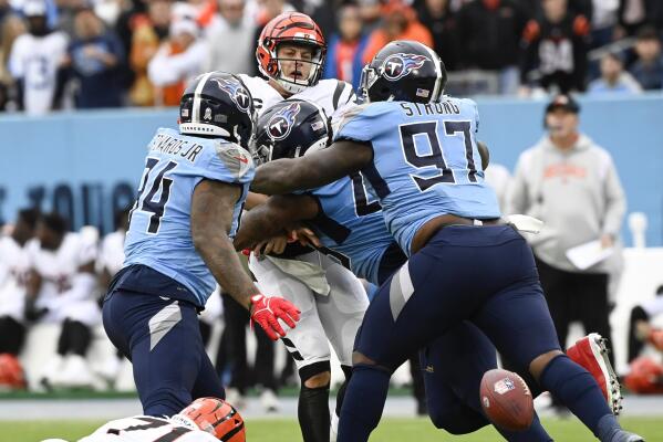 Burrow's TD pass to Higgins lifts Bengals over Titans 20-16